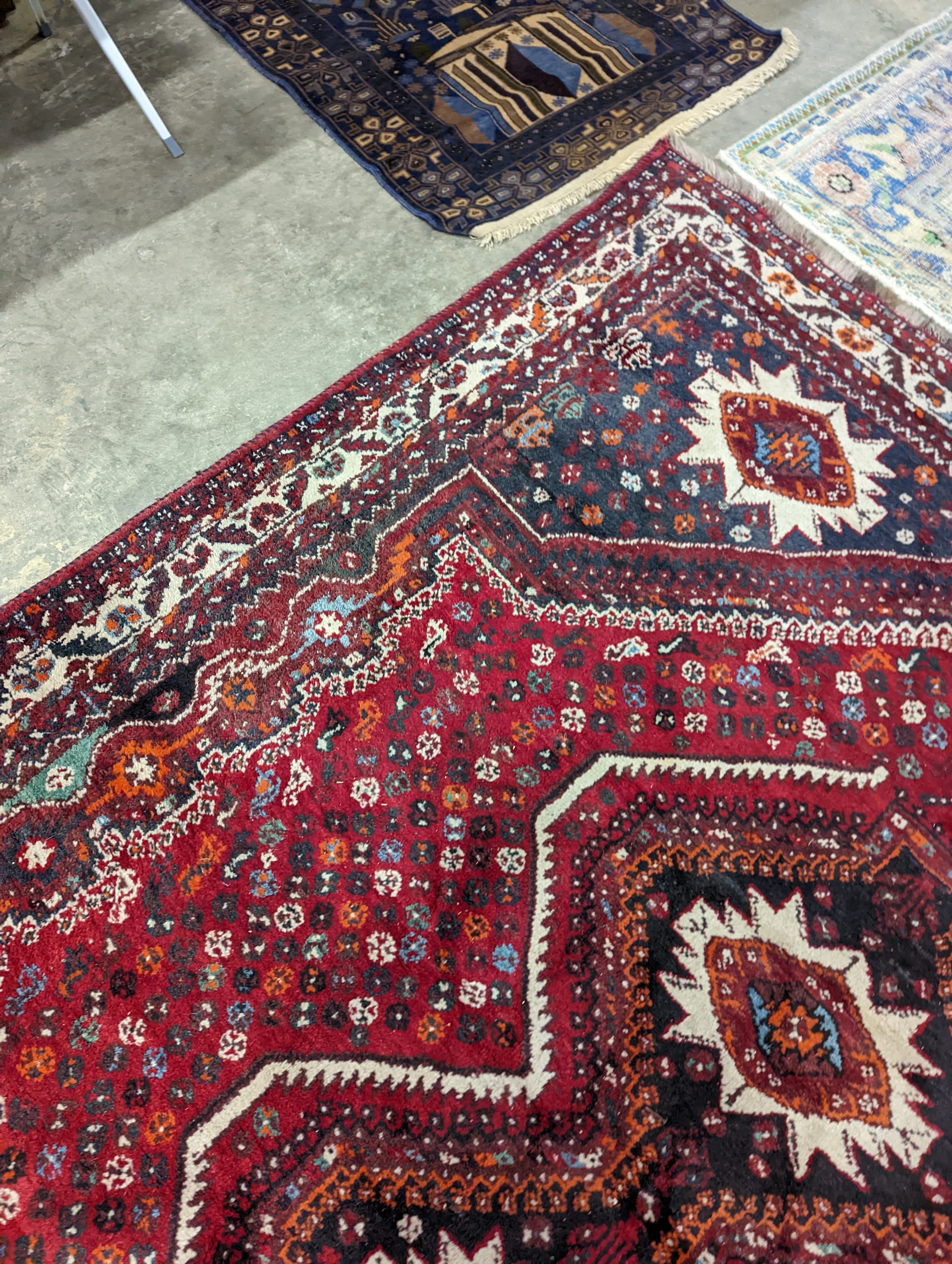 A North West Persian red ground carpet, 335 x 220cm